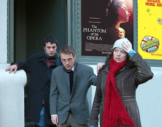 Melodramatized moviegoers exit a theater in Chicago.